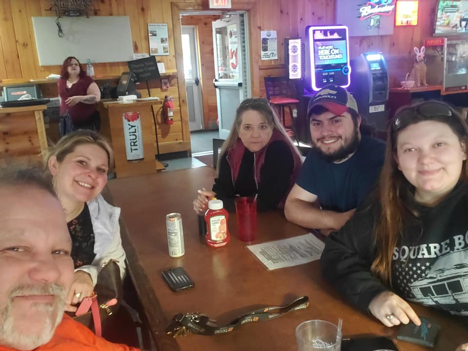 A group sharing dinner together